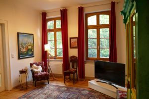 Ferienwohnungen-Hofmann - Gulfhof de Riese Hofmann, Gebäude innen, Sitzecke, Fernsehecke, Wohlfühlen in Ostfriesland, Friesland, Urlaub auf dem Land, Urlaub in Friesland, Ferien im Gulfhof